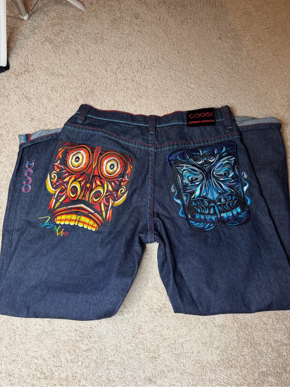 COOGI Men's Dark Blue Jeans with Vibrant Dual Back-Pocket Art